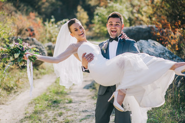 Young wedding couple walking