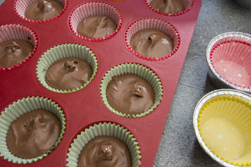 Muffins Dough poured in shape before baking in the oven