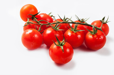 Tomatoes cherry branch isolated on white background