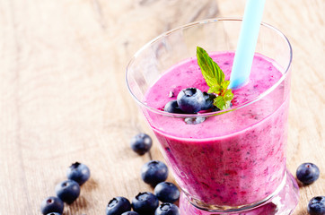 Blueberry shake on white table
