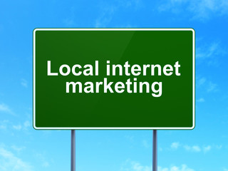 Advertising concept: Local Internet Marketing on road sign background