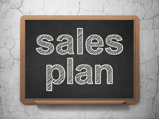 Marketing concept: Sales Plan on chalkboard background