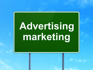 Marketing concept: Advertising Marketing on road sign background