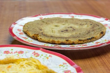 Pancakes served on a plate.