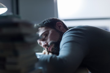 Man sleeping at his desk
