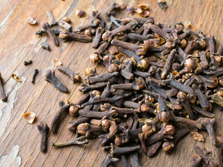 cloves on a wooden background