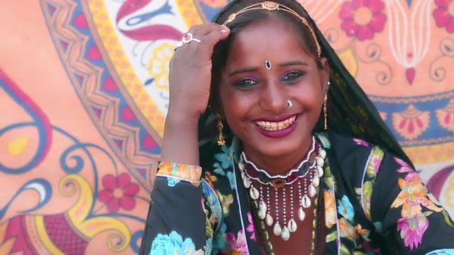 Pan shot of a Traditional Rajasthani woman smiling, Pushkar, Ajmer District, Rajasthan, India