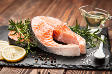 Fresh salmon on old wood