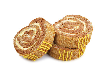 Slices of sweet roll cake isolated on white background