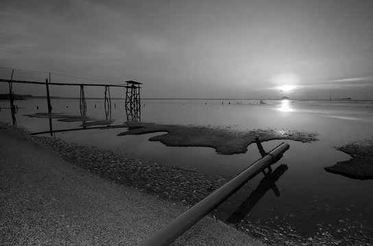 old bridge at jeram beach in black and white mode.