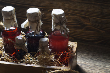 Small bottles of liquor in a wooden box