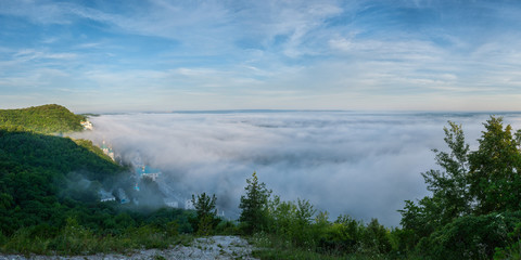 Fog in the valley and the church
