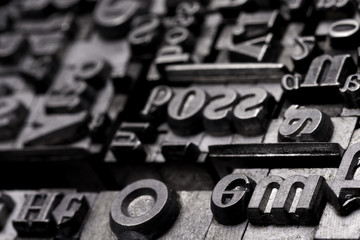 Metal Letterpress Types.
A background from many historic typographical letters in black and white with white background.
 - obrazy, fototapety, plakaty