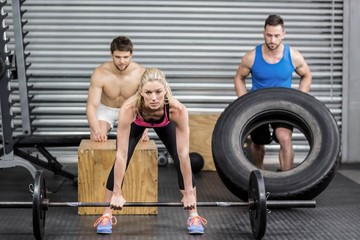 Fototapeta premium Fit people doing exercises