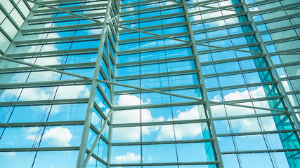 Business building windows and sky reflection