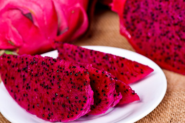 Fototapeta na wymiar beautiful fresh sliced red dragon fruit (pitaya)