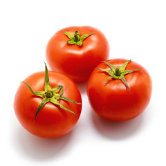 Three tomato vegetables isolated on white background