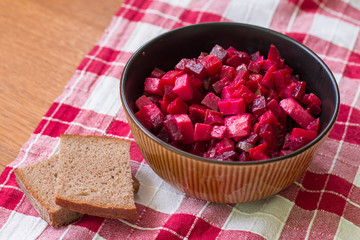 Vinaigrette is a salad in Ukrainian cuisine. It includes diced cooked vegetables (beetroots, potatoes, carrots), chopped onions and brined pickles