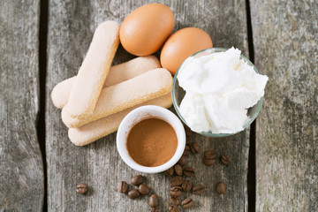 tiramisu ingredients on wooden surface