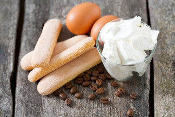 tiramisu ingredients on wooden surface