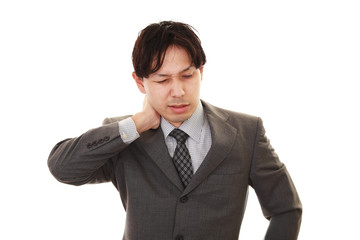 疲れた表情のビジネスマン