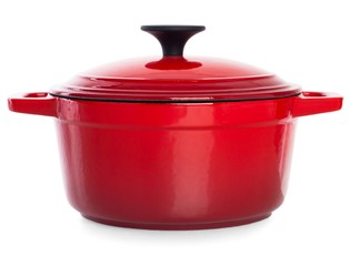 Red cast iron cooking pot, isolated on white background.