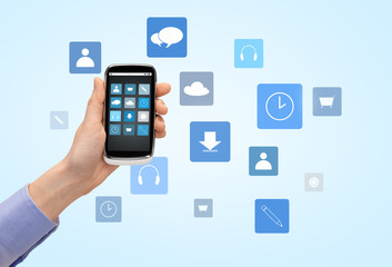 close up of hand with smartphone menu icons