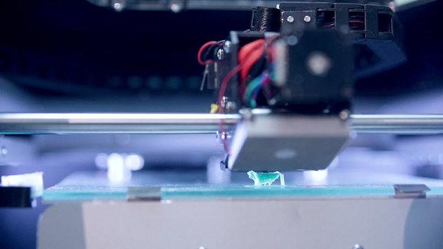 3d printer works, making human (woman) from plastic.