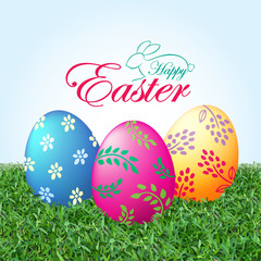 Fototapeta na wymiar Happy Easter Message, Easter Eggs on Grass Vector illustration