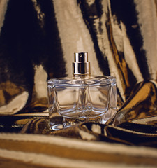 Bottle of perfume in gold tones