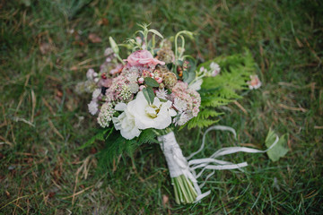wedding bouquet in a rustic style on a green grass
