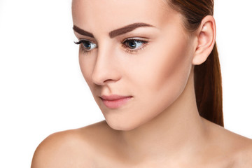 Fototapeta premium The beautiful face of young woman with cleanf fresh skin 