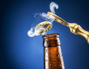 Opening of beer cap with the gas output.