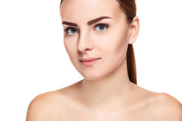The beautiful face of young woman with cleanf fresh skin 