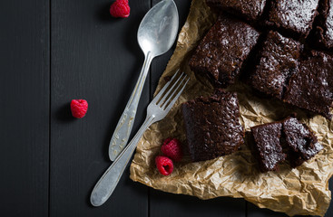 Homemade brownies with fresh raspberries