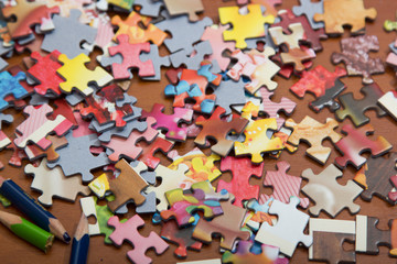 colorful jigsaw puzzle on the desk