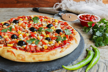 pizza with minced meat tomato cheese corn olives 