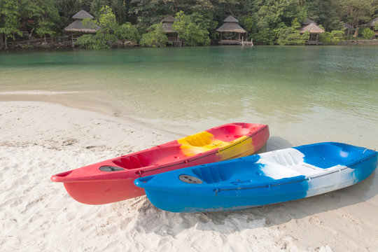 kayaks on sandy beach, koh kood island