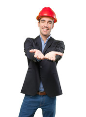 Happy young architect with offer gesture