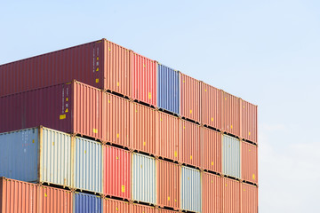 The stack of container in the ship yard at the port before export process