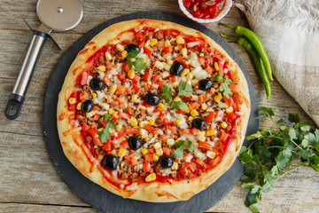 pizza with minced meat tomato cheese corn olives 