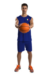 Professional Italian basketball player with ball.