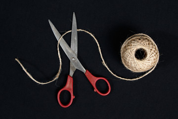  Scissors cut the  packthread