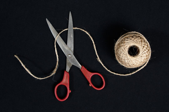  Scissors cut the  packthread