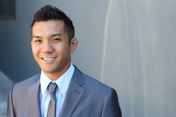 Portrait of a natural handsome classic Asian male with copy space on the right 