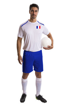 French soccer player holding ball on white background
