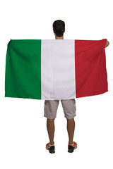 Fan holding the flag of Italy celebrates on white background