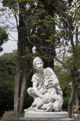 Fototapeta na wymiar View of a small statue in the Citadel Park, Barcelona, Spain.