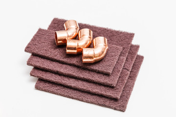 three copper tube bends