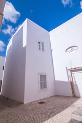 Outdoor view of the typical architecture of the cubist city of Olhao, Portugal.